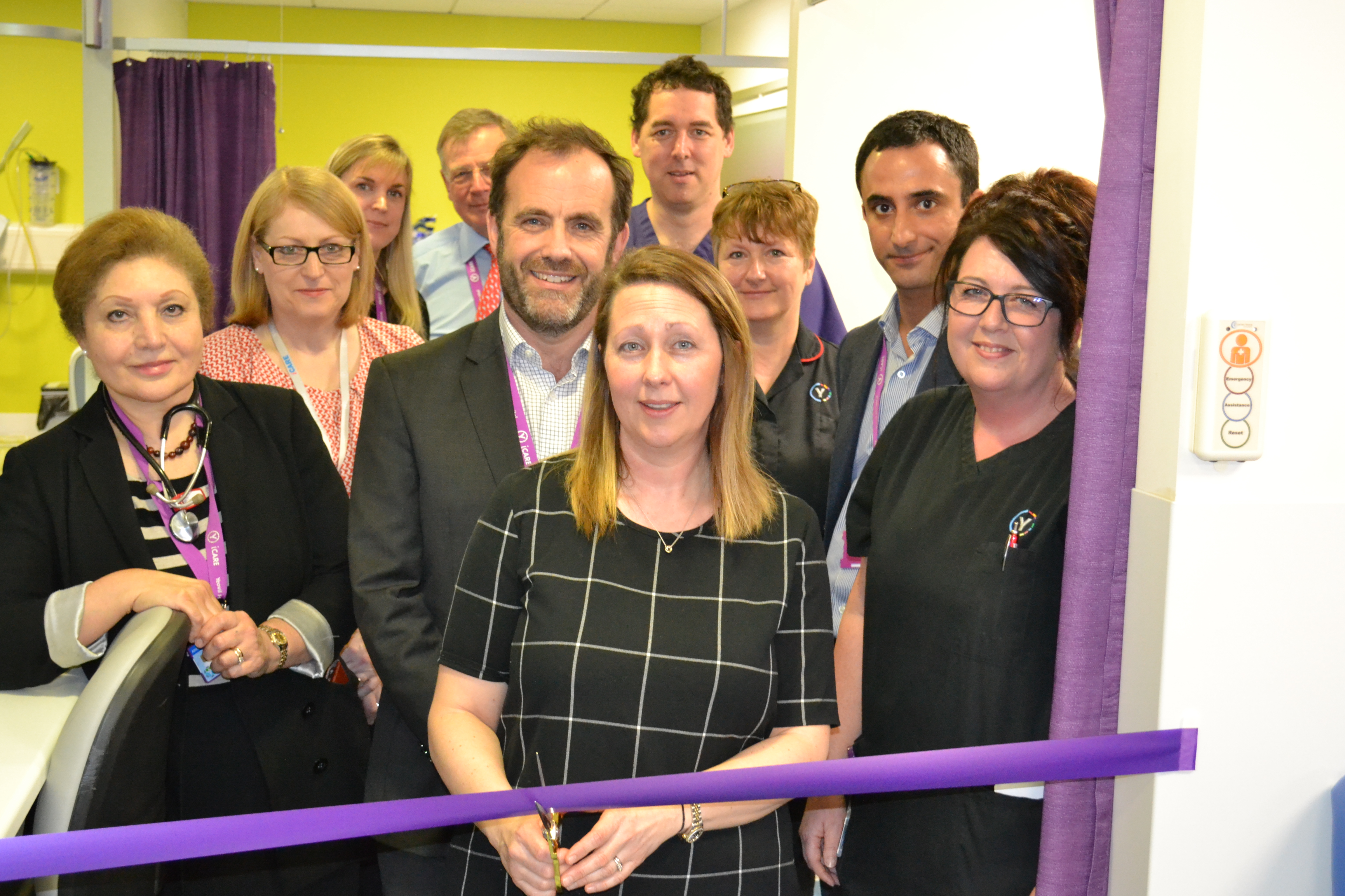 Julie Reeve (front right) and Paul Mears (centre) join Lisa Callow (front), wife of Wayne Callow, in opening the Ambulatory Emergency Care (AEC) Unit at Yeovil Hospital.